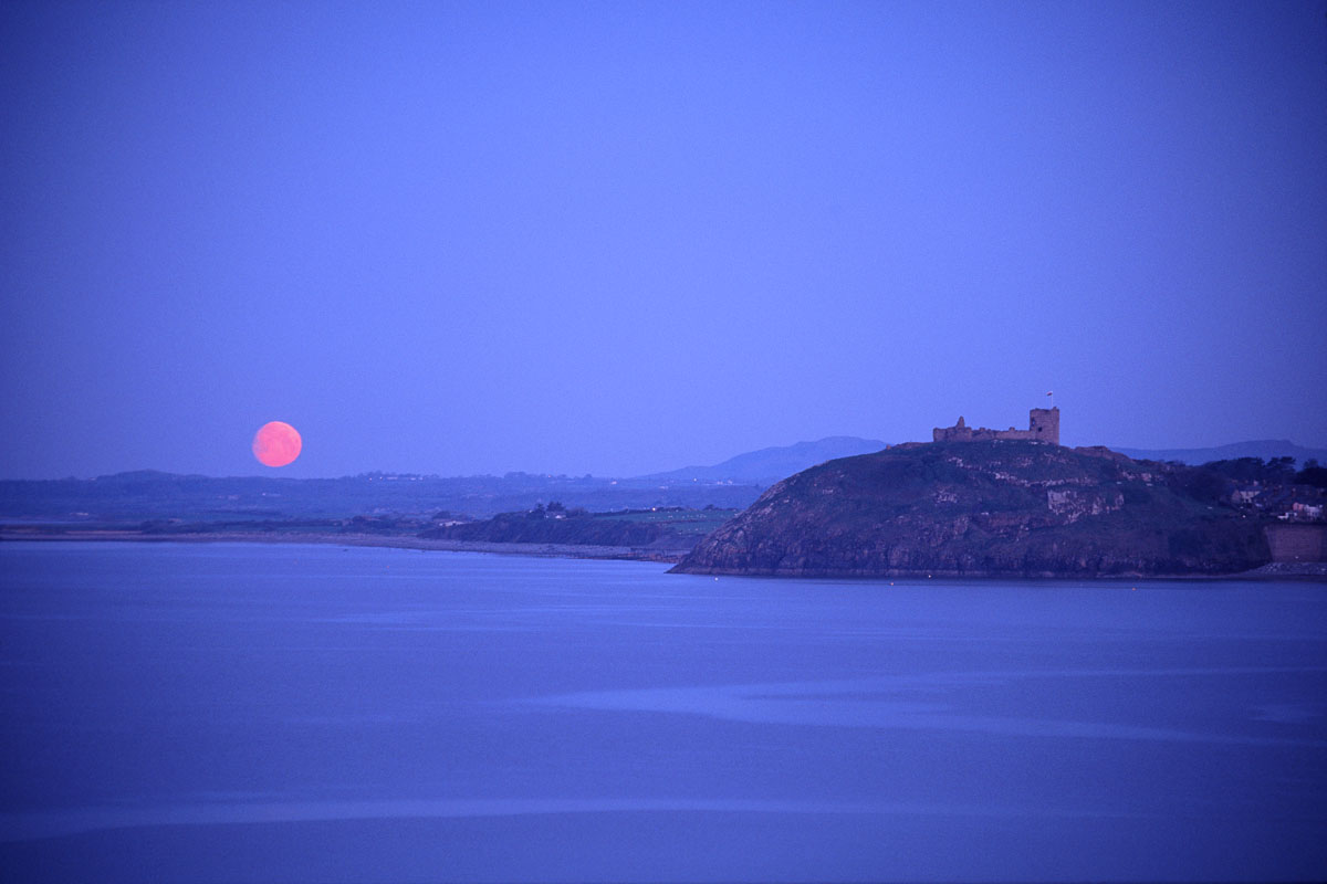 Criccieth Castle and the setting moon